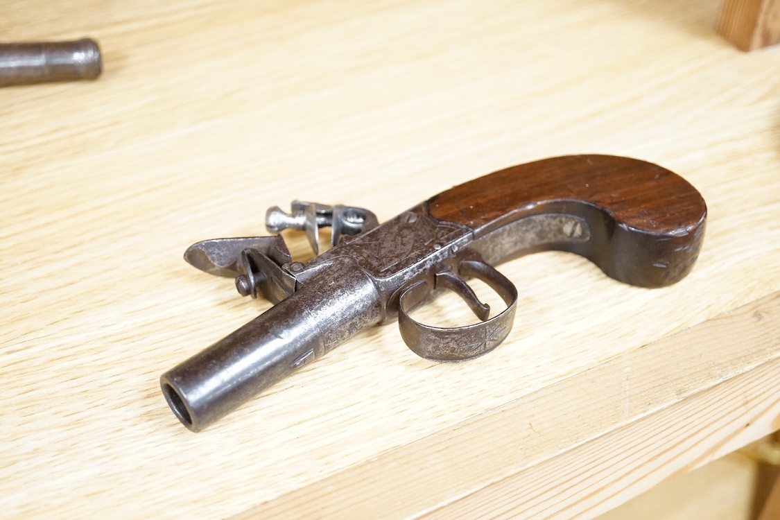 A boxlock flintlock pocket pistol with turn off barrel, Birmingham proved, frame engraved; Salmon and co., sliding safety catch